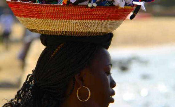 A black girl head carrying